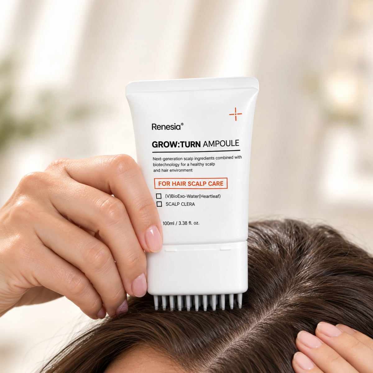 Applying the serum to the part line with the comb-tip applicator